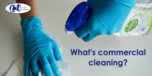 featured image of blog entitled what's commercial cleaning showing two gloved hands disinfecting a surface.