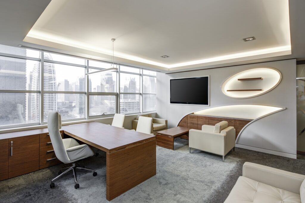 inside of an office with views of a city scape through the window